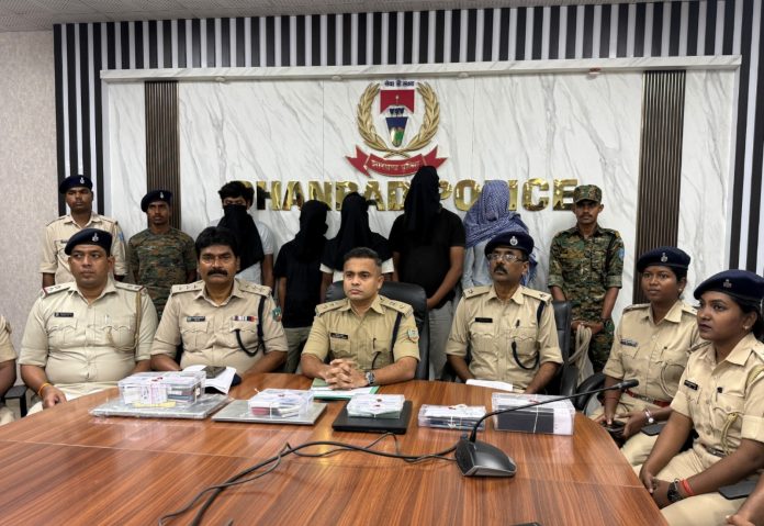 Dhanbad cyber crime, cyber fraud arrested, Tundi police raid, Operation Cyber Shield, Dhanbad police, fake bank accounts, Jharkhand news