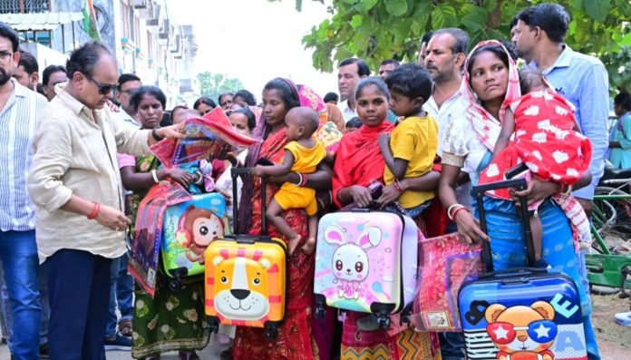Irfan Ansari, Jharkhand health minister, trolley bag distribution, poor families welfare, BJP criticism, Jharkhand politics, regional news